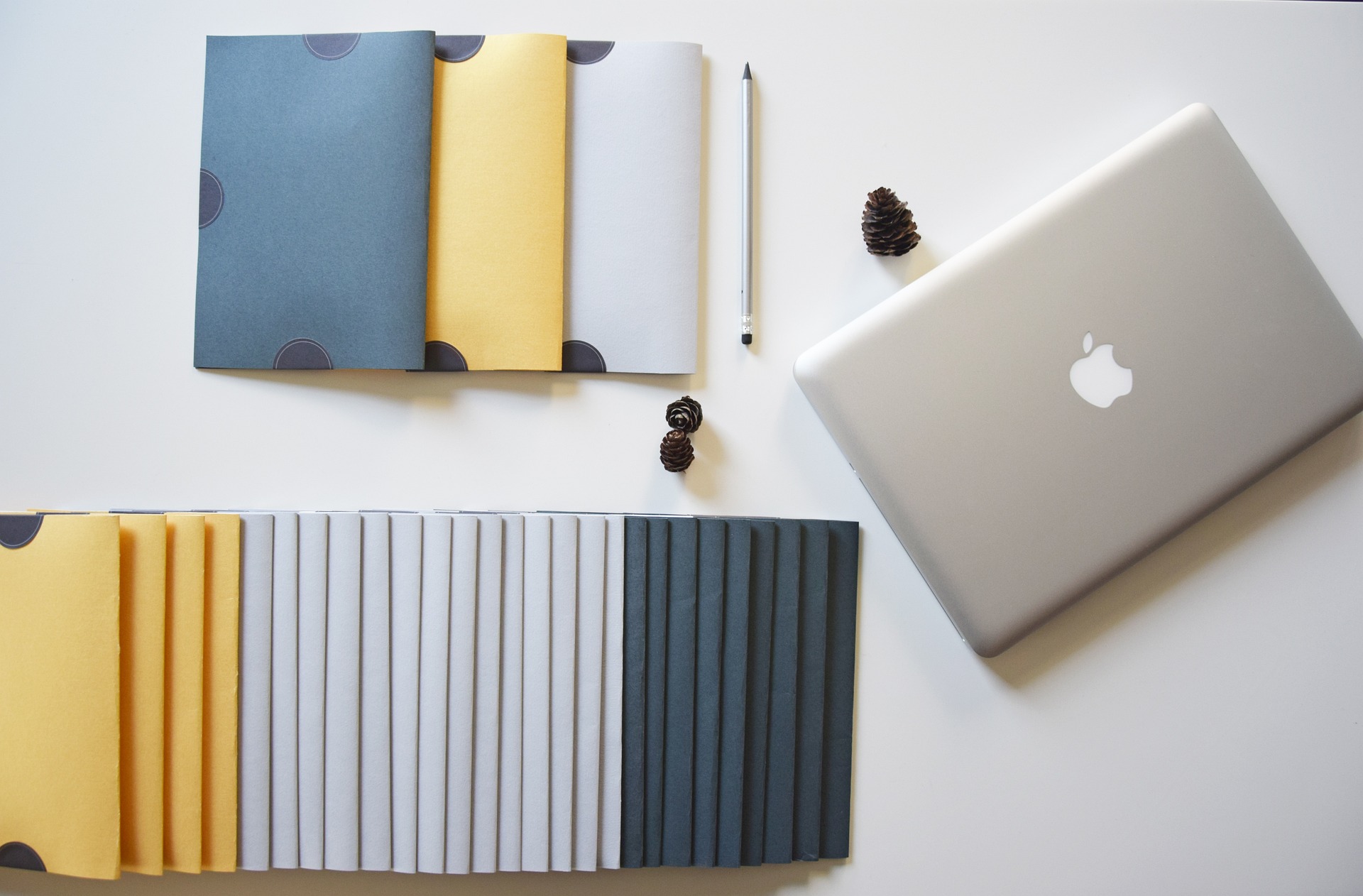macbook and several folders