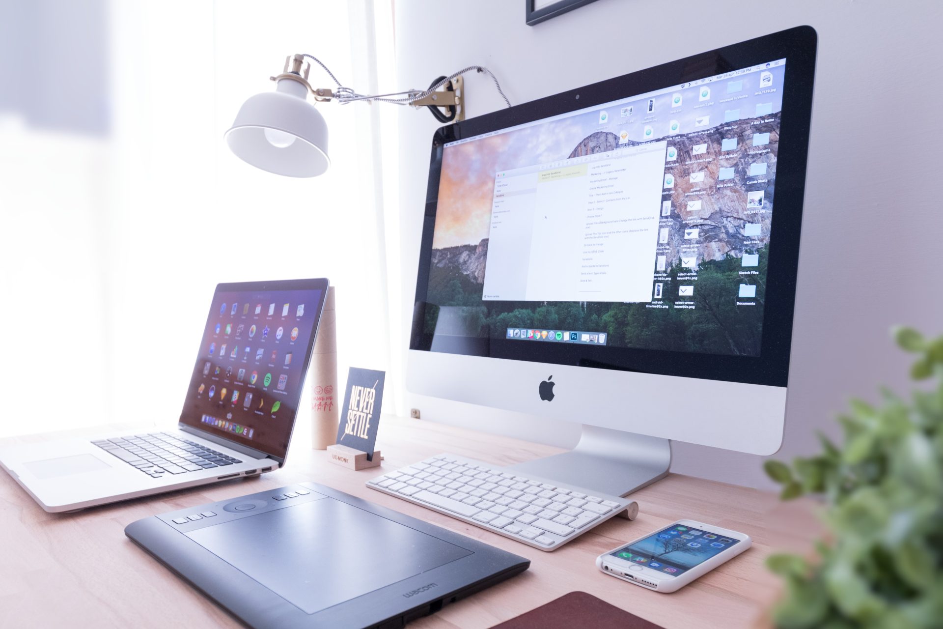 imac, iphone, ipad, macbook on desk