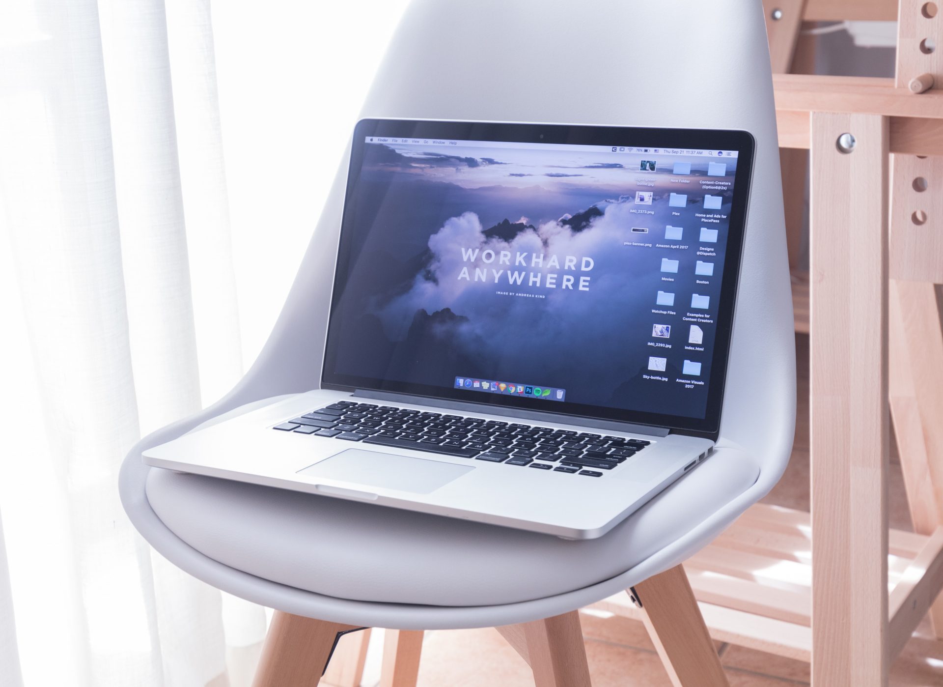 MacBook placed on a chair