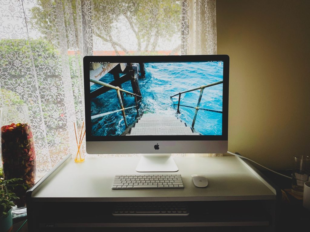 imac with external keyboard and mouse on the table